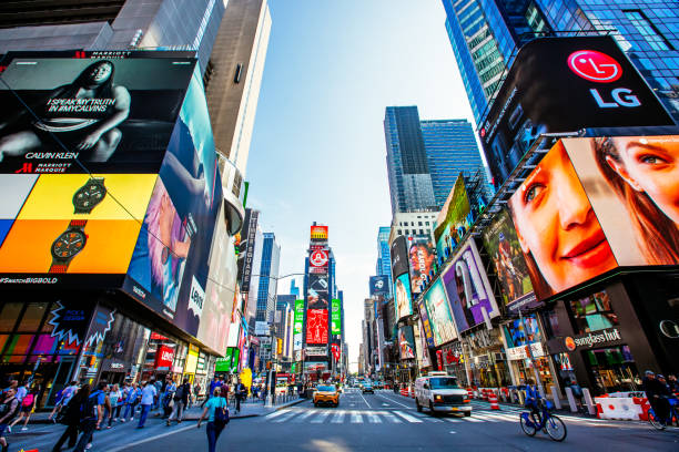 Digital advertising displays and billboards in Times Square, representing multi-platform advertising
